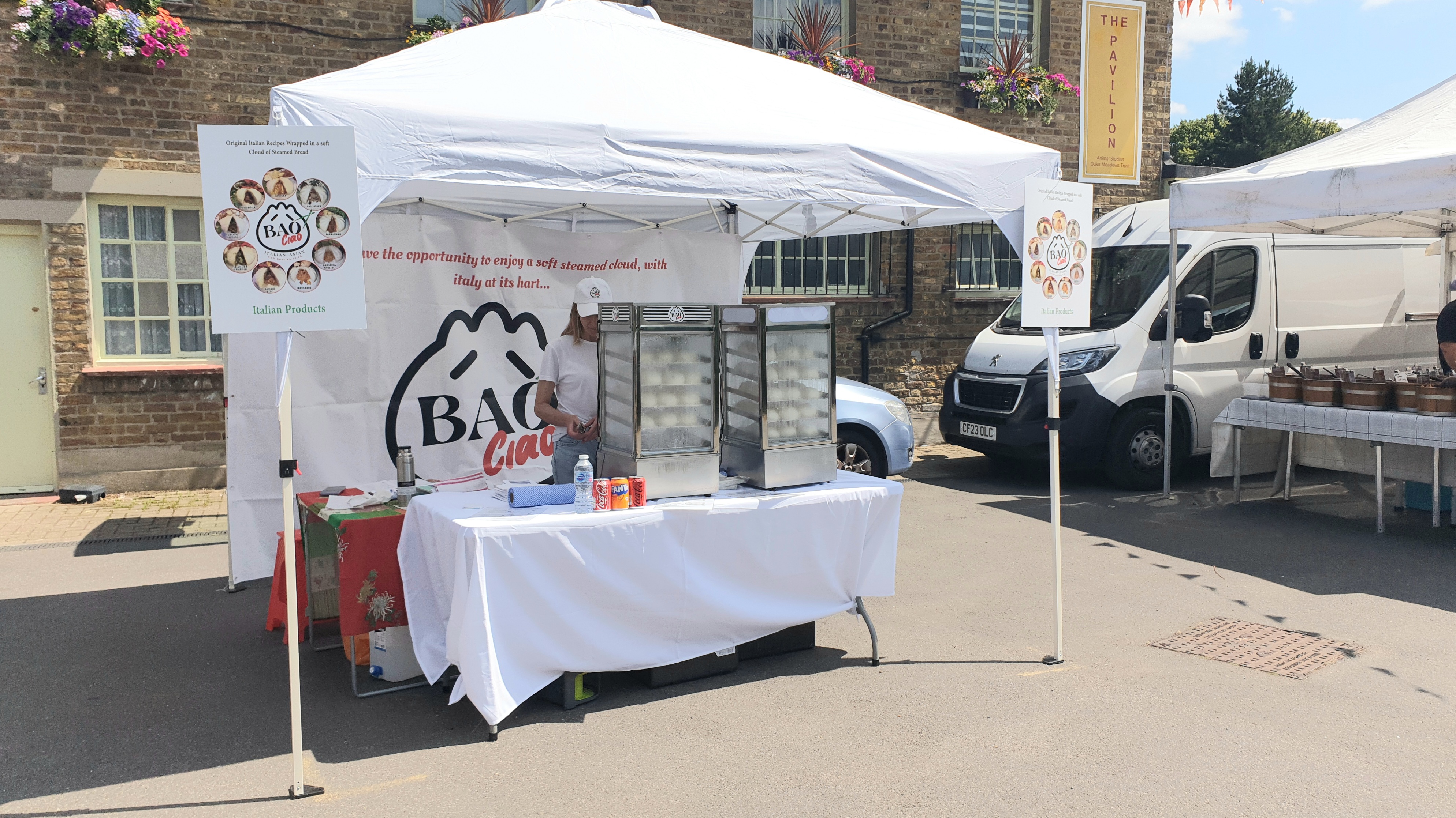 Bao Ciao serving freshly steamed bao from its market stand